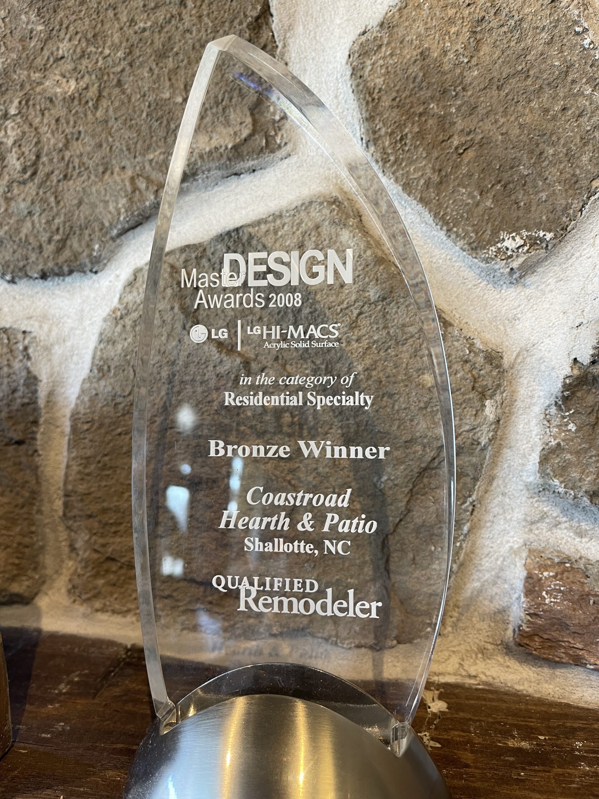 double sided fireplace in living room with custom surround