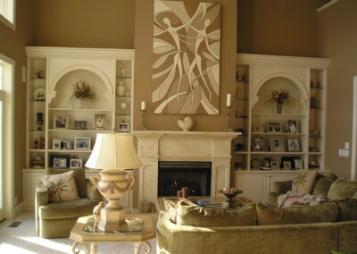 new gas fireplace in living room with stone surround and mantel