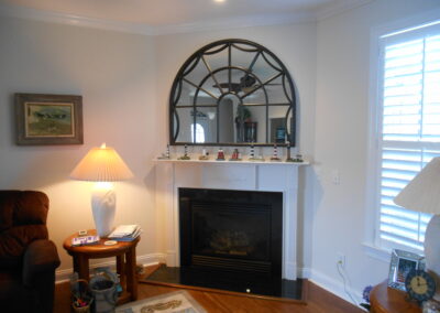 custom white stone fireplace surround